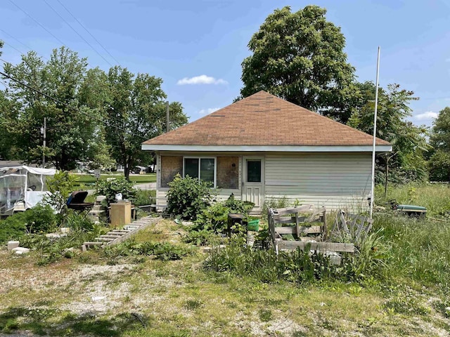380 S Meridian Rd, Mitchell, IN 47446 - rear view of house featuring a shingled roof