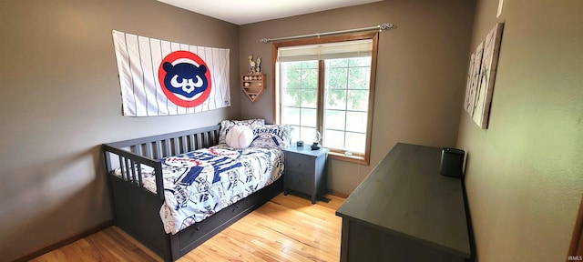 360 E 350 Rd N, Warsaw, IN 46582 - bedroom with baseboards and light wood finished floors
