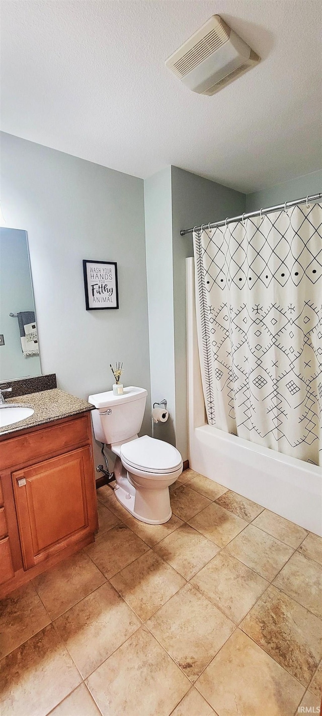 360 E 350 Rd N, Warsaw, IN 46582 - bathroom featuring toilet, vanity, shower / tub combo, and a textured ceiling