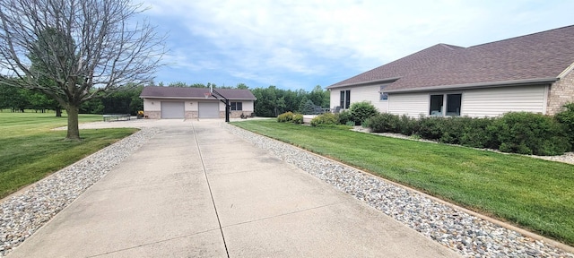 360 E 350 Rd N, Warsaw, IN 46582 - view of home's exterior featuring a lawn and a shingled roof