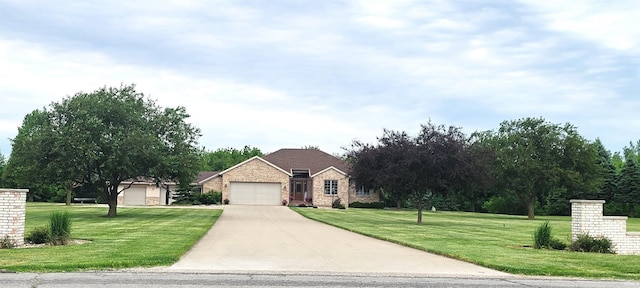 360 E 350 Rd N, Warsaw, IN 46582 - view of front of property featuring an attached garage, a front yard, and driveway