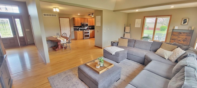 360 E 350 Rd N, Warsaw, IN 46582 - living area featuring light wood-style floors, plenty of natural light, and recessed lighting