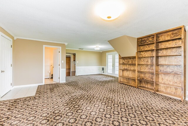 7782 S Warren Rd, Warren, IN 46792 - spare room with carpet flooring, crown molding, and a textured ceiling