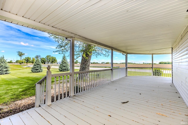 7782 S Warren Rd, Warren, IN 46792 - wooden terrace with a lawn