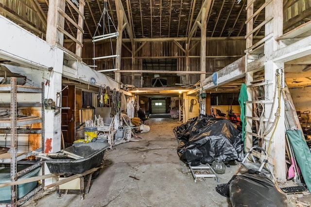 7782 S Warren Rd, Warren, IN 46792 - miscellaneous room featuring unfinished concrete flooring