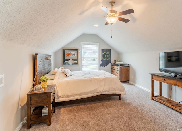 7937 Boydon Ct, Evansville, IN 47715 - carpeted bedroom with lofted ceiling, baseboards, ceiling fan, and a textured ceiling