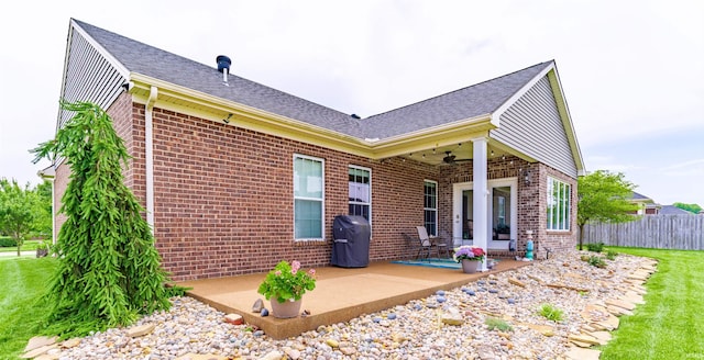 7937 Boydon Ct, Evansville, IN 47715 - rear view of house with brick siding, a ceiling fan, a patio, and roof with shingles