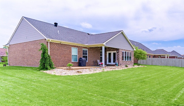 7937 Boydon Ct, Evansville, IN 47715 - back of property with brick siding, a patio, and roof with shingles