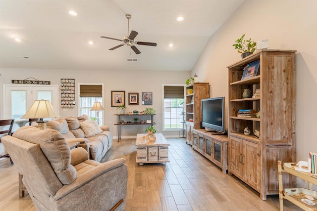 7937 Boydon Ct, Evansville, IN 47715 - living room with a ceiling fan, vaulted ceiling, recessed lighting, and light wood-type flooring