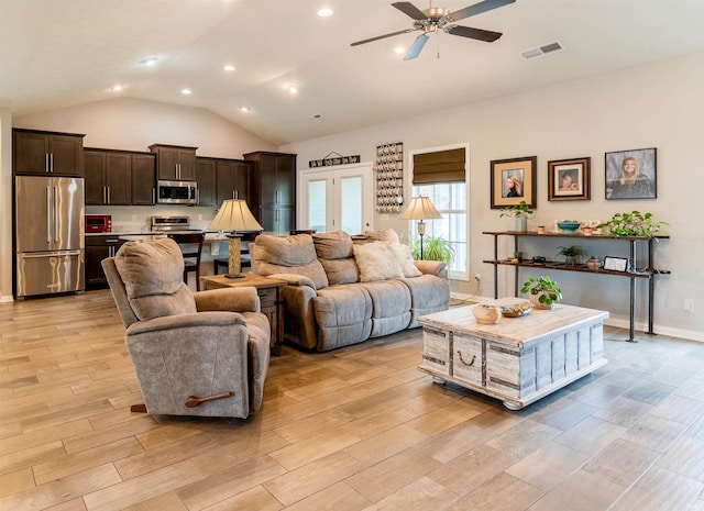 7937 Boydon Ct, Evansville, IN 47715 - living room featuring lofted ceiling, light wood-style flooring, ceiling fan, recessed lighting, and baseboards