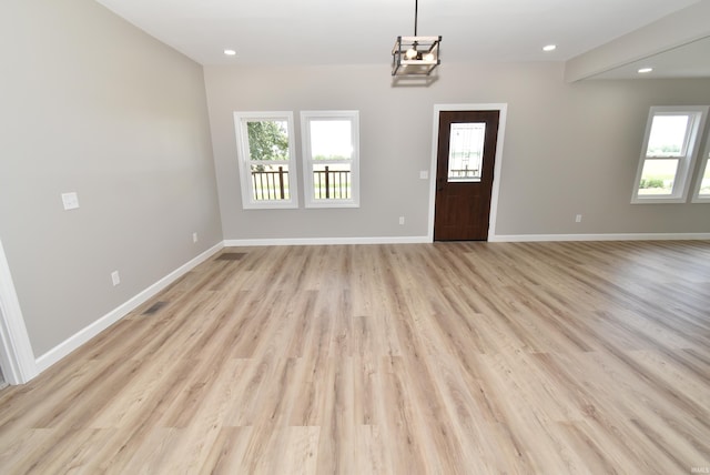 4831 N 400 W, Earl Park, IN 47942 - foyer entrance with healthy amount of natural light, baseboards, light wood-type flooring, and recessed lighting