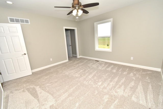 4831 N 400 W, Earl Park, IN 47942 - unfurnished bedroom featuring carpet flooring, baseboards, and a ceiling fan