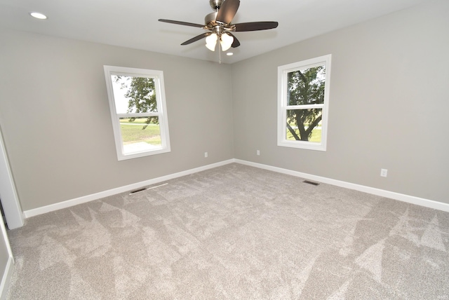 4831 N 400 W, Earl Park, IN 47942 - carpeted empty room with healthy amount of natural light, ceiling fan, baseboards, and recessed lighting
