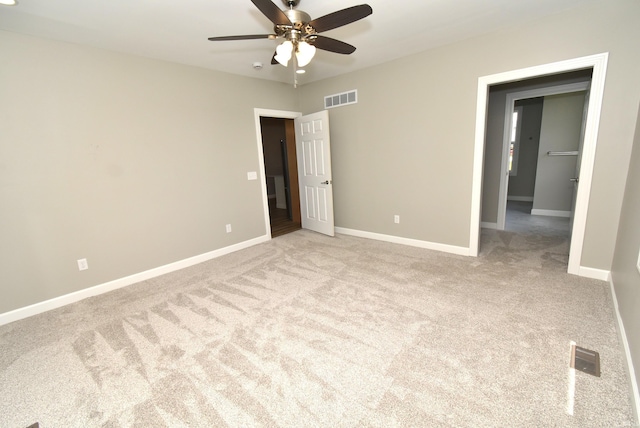 4831 N 400 W, Earl Park, IN 47942 - unfurnished bedroom with light colored carpet, baseboards, and a ceiling fan