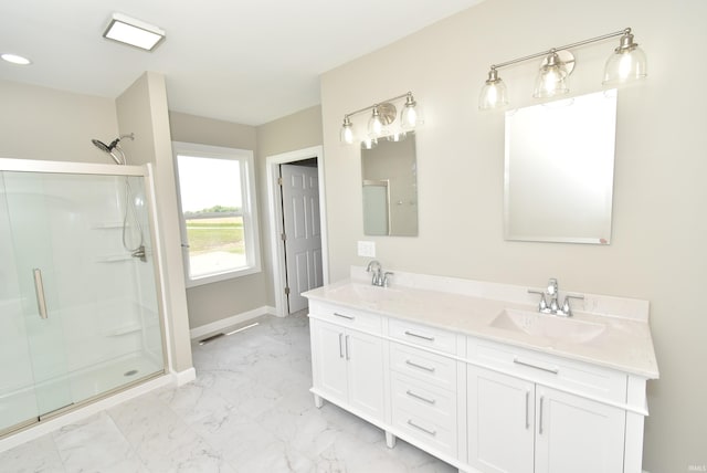 4831 N 400 W, Earl Park, IN 47942 - bathroom featuring marble finish flooring, a shower stall, double vanity, and baseboards