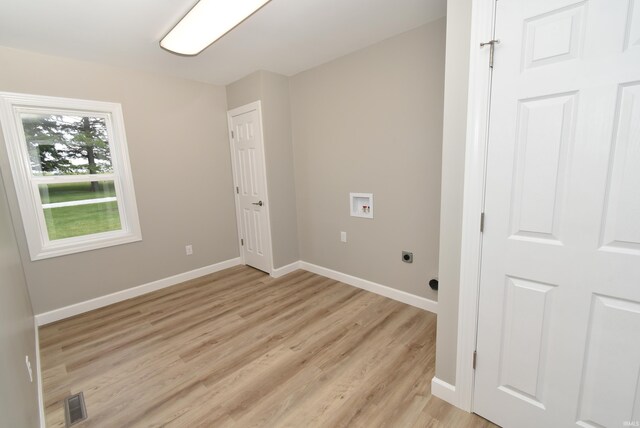 4831 N 400 W, Earl Park, IN 47942 - washroom with hookup for a washing machine, baseboards, light wood-style flooring, and electric dryer hookup