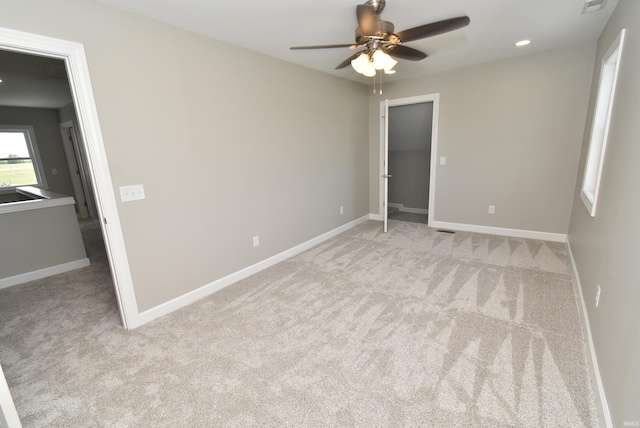 4831 N 400 W, Earl Park, IN 47942 - unfurnished bedroom with light colored carpet, baseboards, ceiling fan, and recessed lighting