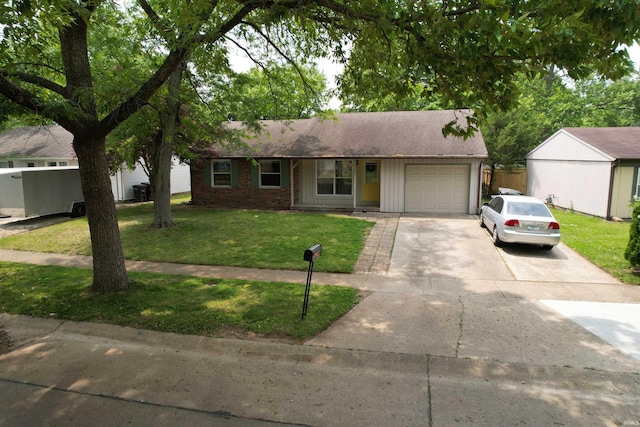 3224 Commanche Trl, Lafayette, IN 47909 - single story home with an attached garage, concrete driveway, a front yard, and brick siding