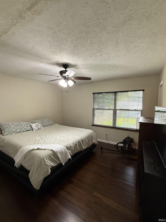 3224 Commanche Trl, Lafayette, IN 47909 - bedroom with wood finished floors, a ceiling fan, a textured ceiling, and baseboards