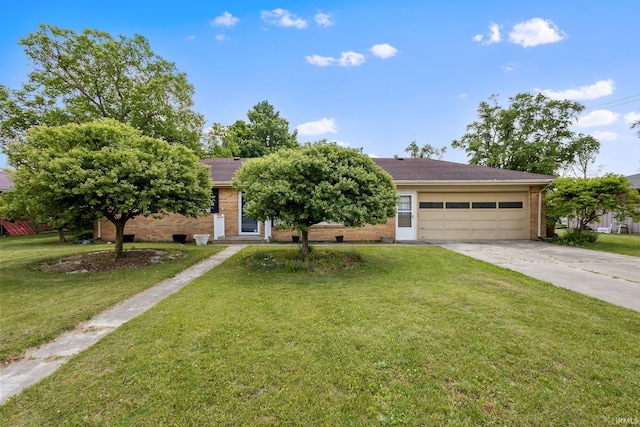 211 Condo St, Monticello, IN 47960 - obstructed view of property with concrete driveway, brick siding, a front yard, and an attached garage