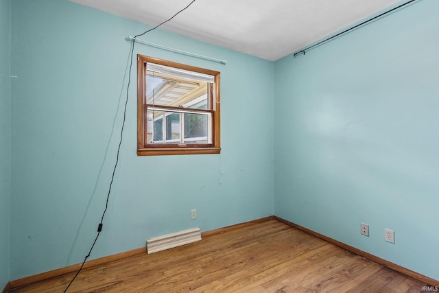 211 Condo St, Monticello, IN 47960 - unfurnished room featuring baseboards and light wood-style floors