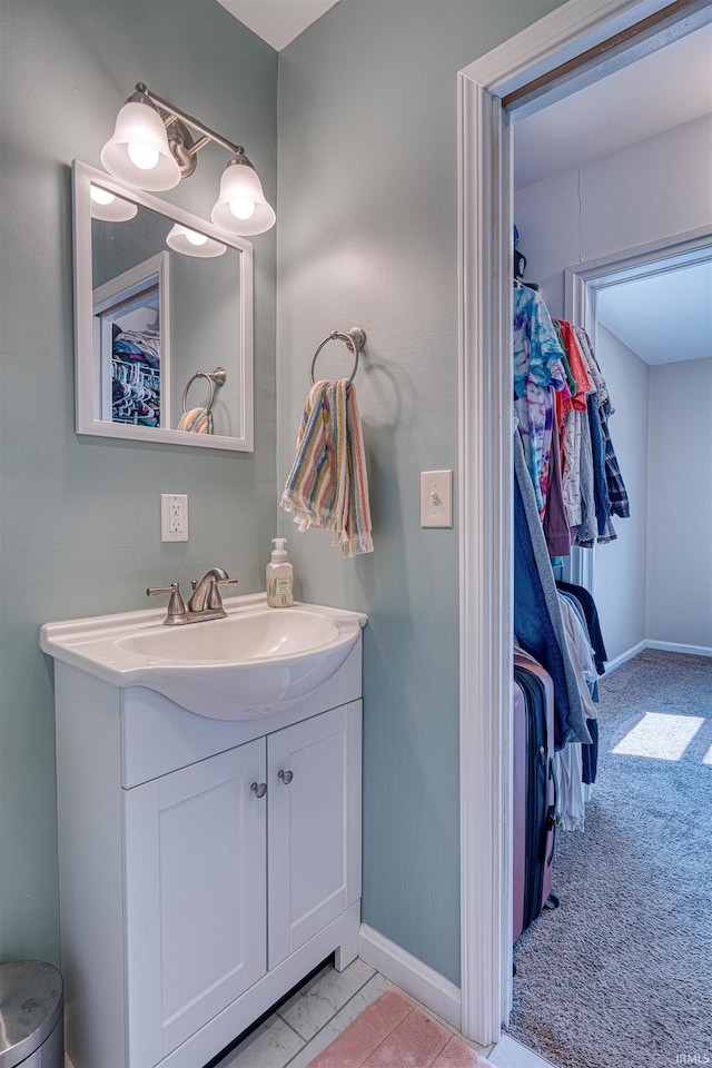 3017 E Walnut St, Evansville, IN 47714 - bathroom featuring vanity and baseboards