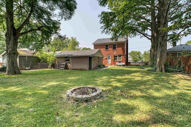 3017 E Walnut St, Evansville, IN 47714 - view of yard with a fire pit