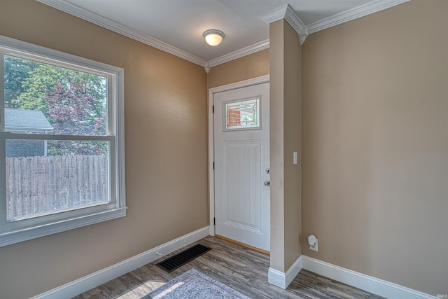3017 E Walnut St, Evansville, IN 47714 - entrance foyer featuring healthy amount of natural light, wood finished floors, baseboards, and crown molding