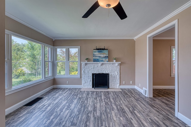 3017 E Walnut St, Evansville, IN 47714 - unfurnished living room featuring crown molding, baseboards, wood finished floors, ceiling fan, and healthy amount of natural light