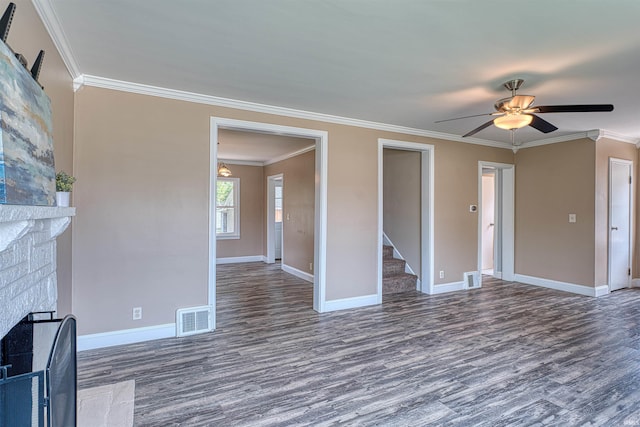 3017 E Walnut St, Evansville, IN 47714 - unfurnished living room with wood finished floors, ornamental molding, baseboards, a brick fireplace, and a ceiling fan