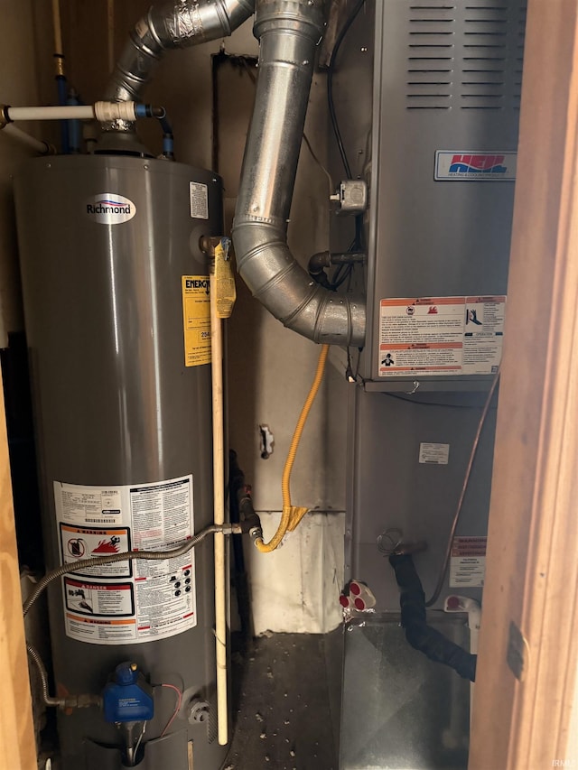 1406 N Philips St, Kokomo, IN 46901 - utility room with water heater and heating unit
