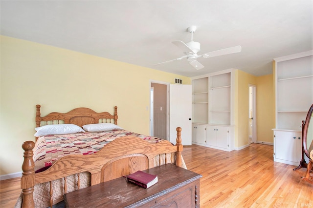 54559 Whispering Oak Dr, Mishawaka, IN 46545 - bedroom featuring light wood-type flooring, a ceiling fan, and baseboards