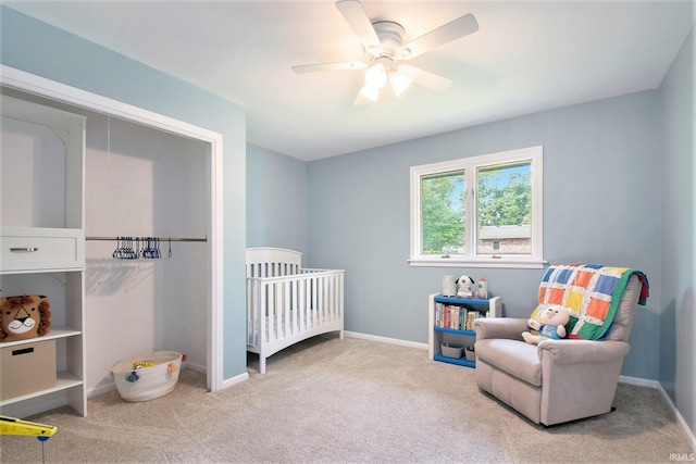 54559 Whispering Oak Dr, Mishawaka, IN 46545 - bedroom featuring carpet floors, a crib, baseboards, and ceiling fan