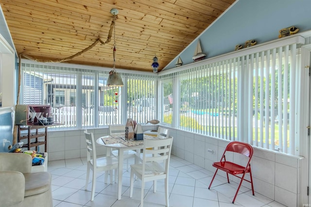 11382 N Biscayne Ln, Cromwell, IN 46732 - sunroom featuring tile patterned floors, wood ceiling, and lofted ceiling