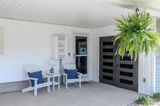 11382 N Biscayne Ln, Cromwell, IN 46732 - entrance to property featuring a porch and an attached garage