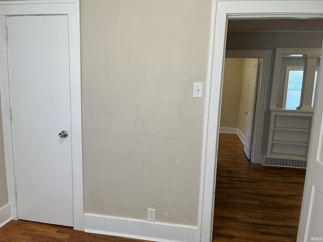 1311 S 31st St, South Bend, IN 46615 - hall with dark wood finished floors and baseboards