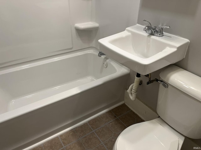 1311 S 31st St, South Bend, IN 46615 - bathroom with toilet, tile patterned flooring, and a sink
