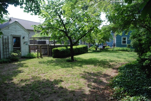 2310 Homewood Ave, Mishawaka, IN 46544 - view of green lawn featuring a wooden deck