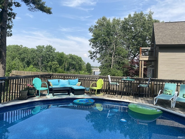 2310 Homewood Ave, Mishawaka, IN 46544 - view of swimming pool featuring a wooden deck and an outdoor hangout area