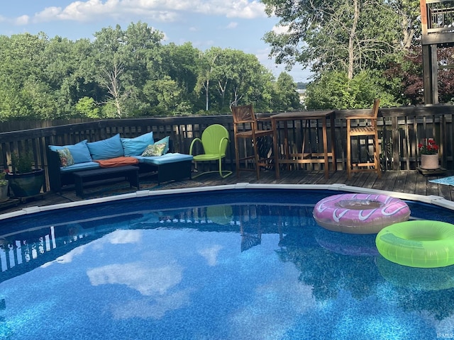 2310 Homewood Ave, Mishawaka, IN 46544 - view of swimming pool with a deck and an outdoor living space