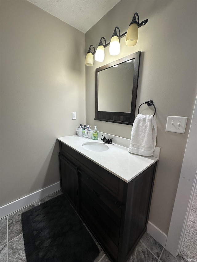 12524 W 545 N, Linton, IN 47441 - bathroom with vanity, a textured ceiling, and baseboards