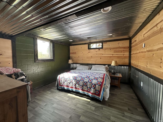 12524 W 545 N, Linton, IN 47441 - bedroom with wooden walls, wood finished floors, and concrete block wall