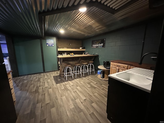 12524 W 545 N, Linton, IN 47441 - indoor bar with concrete block wall and wood finished floors