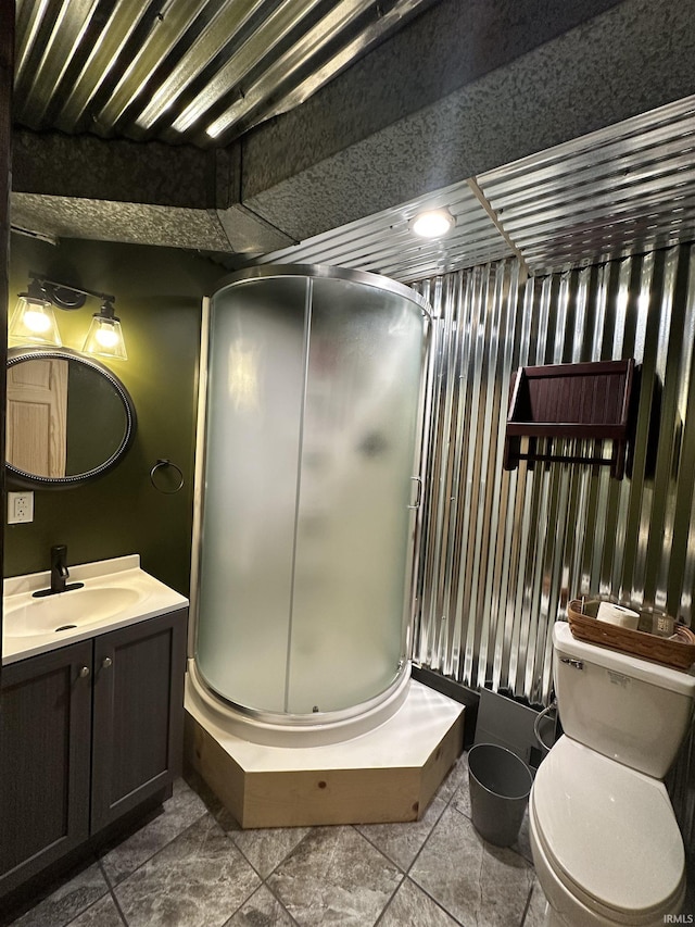12524 W 545 N, Linton, IN 47441 - bathroom with vanity, a stall shower, toilet, and tile patterned floors