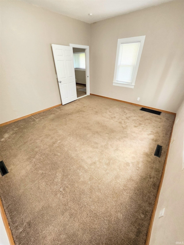 436 E Taber St, Fort Wayne, IN 46803 - carpeted empty room with baseboards