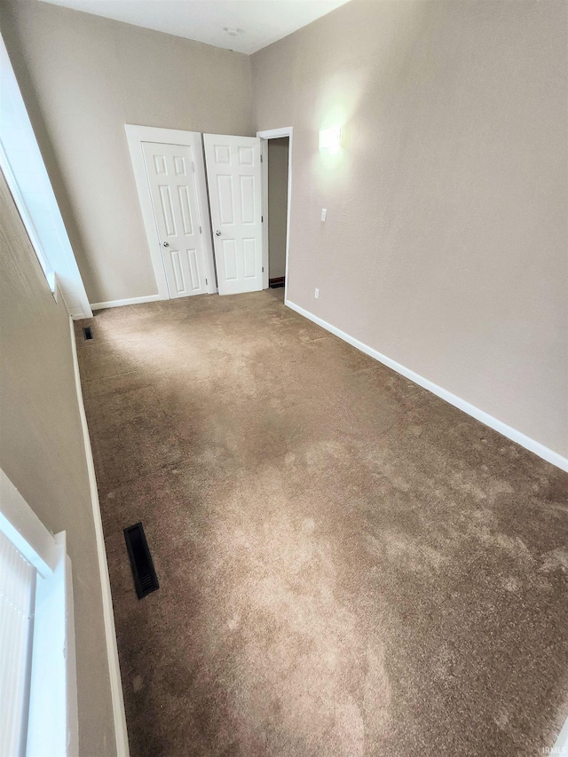 436 E Taber St, Fort Wayne, IN 46803 - unfurnished bedroom with carpet flooring and baseboards