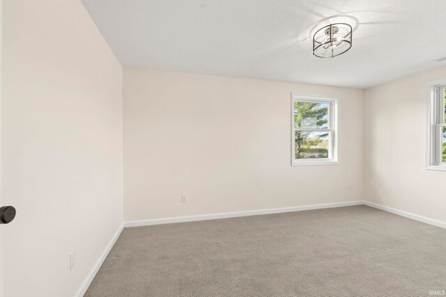 11136 N 200 W, Ossian, IN 46777 - carpeted empty room featuring baseboards