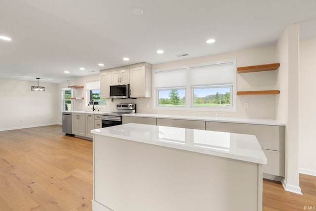 11136 N 200 W, Ossian, IN 46777 - kitchen featuring open shelves, appliances with stainless steel finishes, baseboards, backsplash, and recessed lighting
