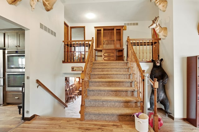 2090 S Warren Rd, Huntington, IN 46750 - stairway with wood finished floors and baseboards