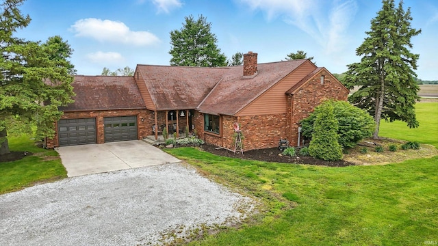 2090 S Warren Rd, Huntington, IN 46750 - view of front of house with driveway, an attached garage, brick siding, and a front lawn